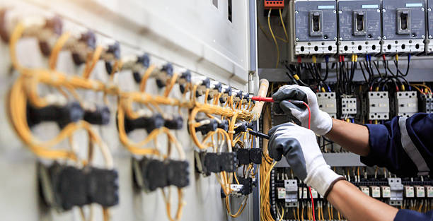 Professional Electrician technician working in Lakewood Park, FL